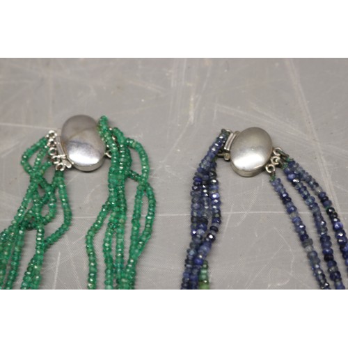 48 - Two strung gemstone necklaces, comprised of a five strand strung faceted emerald bead necklet, consi... 
