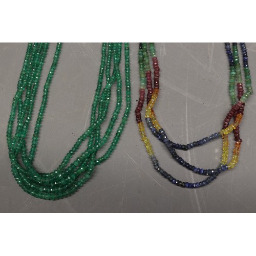 48 - Two strung gemstone necklaces, comprised of a five strand strung faceted emerald bead necklet, consi... 