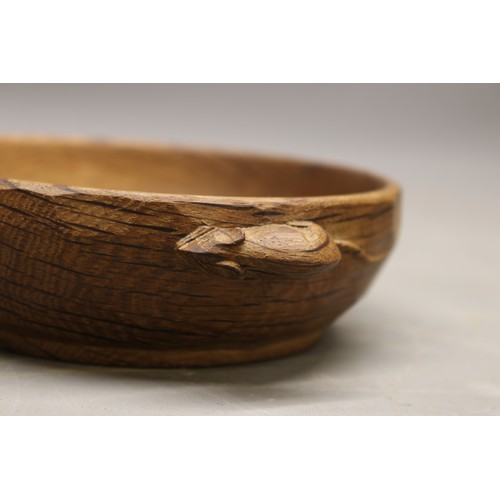 Robert Mouseman Thompson of Kilburn - an oak nut dish, hand tooled exterior carved with signature mo... 