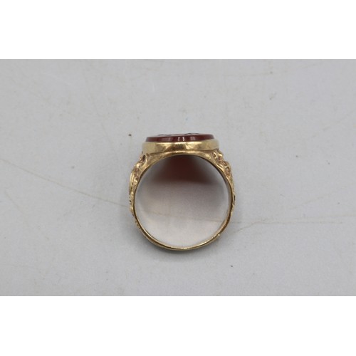6 - Stamped 9ct yellow gold intaglio signet ring, comprised of one oval carnelian stone measuring approx... 