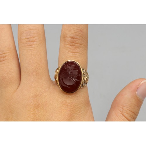 6 - Stamped 9ct yellow gold intaglio signet ring, comprised of one oval carnelian stone measuring approx... 