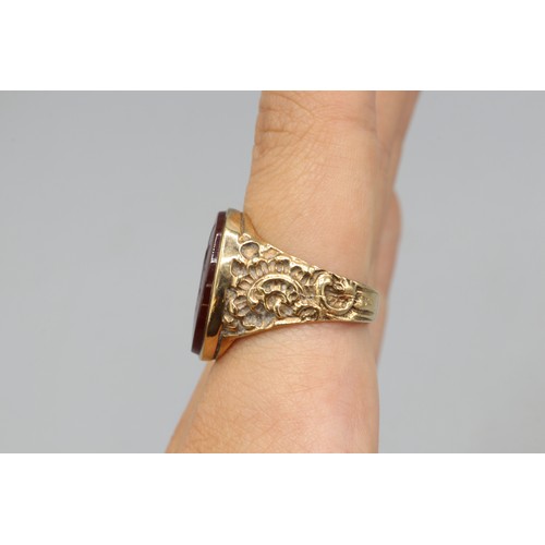 6 - Stamped 9ct yellow gold intaglio signet ring, comprised of one oval carnelian stone measuring approx... 