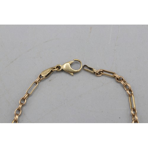 11 - Stamped 9ct yellow gold belcher Figaro link bracelet, with double ribbed link detail. Length 8