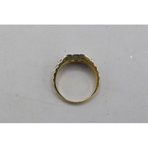 8 - Hallmarked 18ct two-tone Jubilee bracelet-style diamond ring, comprised of 9 pavé-set round-cut diam... 