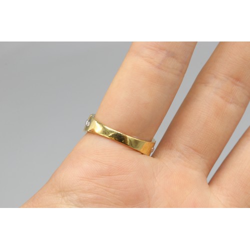 8 - Hallmarked 18ct two-tone Jubilee bracelet-style diamond ring, comprised of 9 pavé-set round-cut diam... 