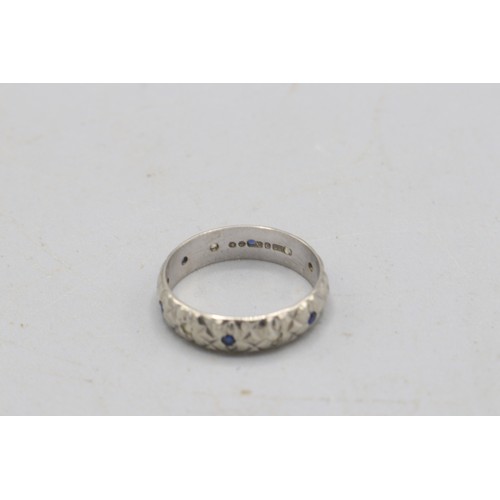 50 - Hallmarked 9ct white gold diamond cut blue and white stone band ring, comprised of alternating round... 