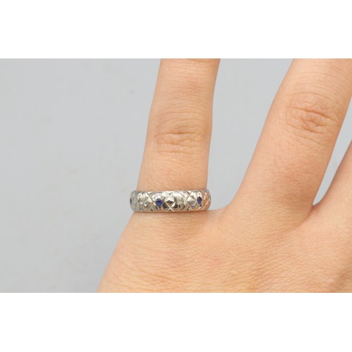 50 - Hallmarked 9ct white gold diamond cut blue and white stone band ring, comprised of alternating round... 