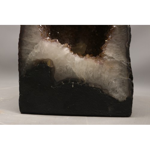  *RE-PHOTO* Amethyst geode, a free-standing cut-through specimen displaying a hollow interior cavity ... 