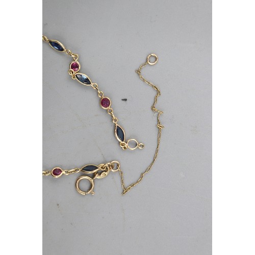 15 - Hallmarked 9ct yellow gold sapphire and ruby chain link bracelet, comprised of alternating bezel-set... 