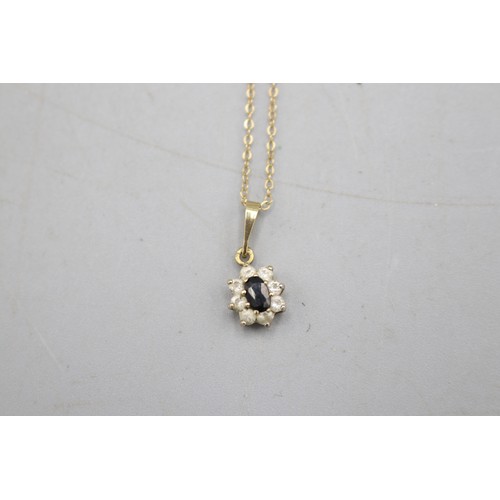 42 - 9ct yellow gold pendants, comprised of a hallmarked 9ct yellow gold heart locket with small pavé sta... 