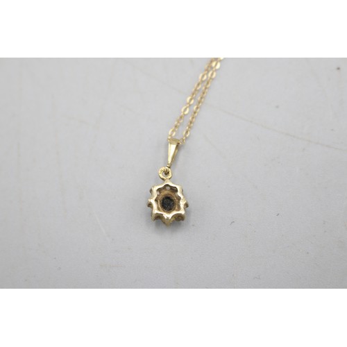 42 - 9ct yellow gold pendants, comprised of a hallmarked 9ct yellow gold heart locket with small pavé sta... 