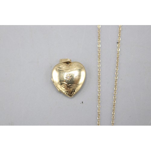 42 - 9ct yellow gold pendants, comprised of a hallmarked 9ct yellow gold heart locket with small pavé sta... 