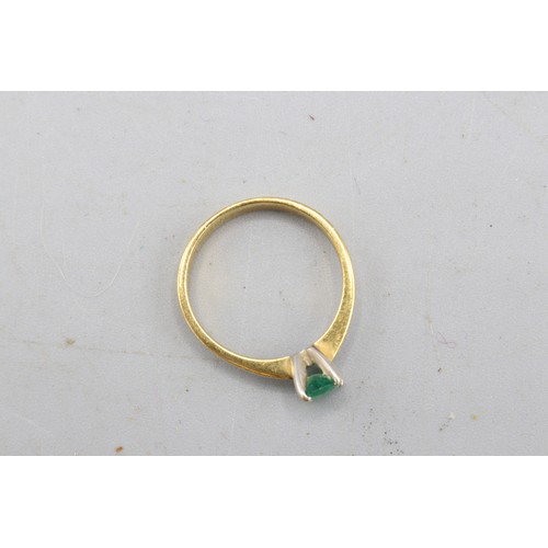 28 - Stamped 18ct yellow gold emerald solitaire ring, comprising one oval faceted emerald measuring appro... 