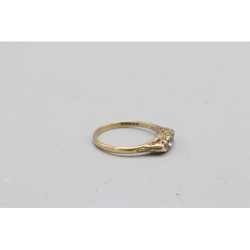 57 - Hallmarked 9ct yellow gold cubic zirconia boat head trilogy ring, comprised of three round brilliant... 
