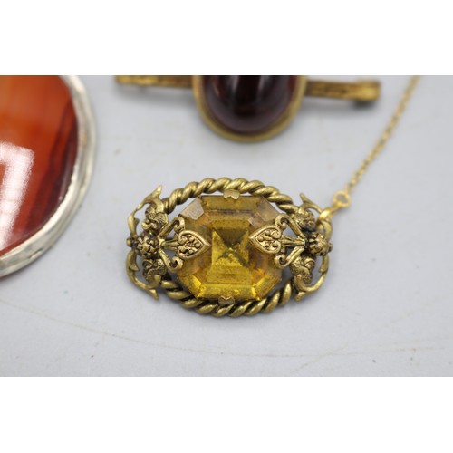 55 - Mixed lot of assorted Victorian gem-set jewellery, comprising a gilt metal brown banded agate bar br... 