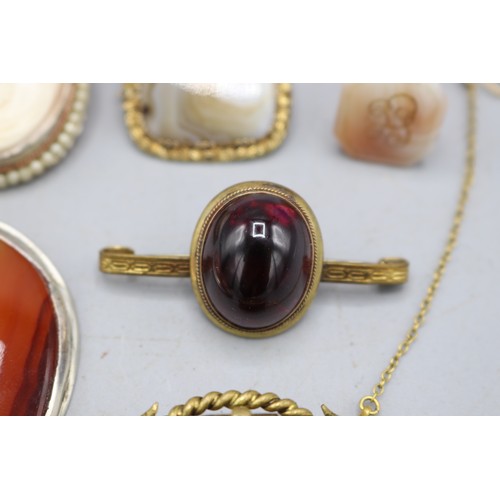 55 - Mixed lot of assorted Victorian gem-set jewellery, comprising a gilt metal brown banded agate bar br... 