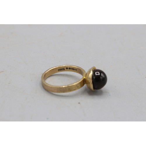 29 - Hallmarked 9ct yellow gold tiger's eye bead solitaire ring, comprising a 7.5mm tiger's eye bead cup-... 