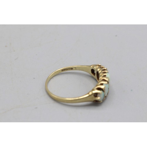 49 - Hallmarked 9ct yellow gold opal boat-head ring, comprising five graduating oval opals, one of which ... 
