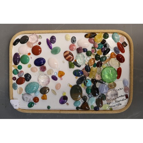 Very large mixed lot of over 120 cut and polished gemstones, comprising ...