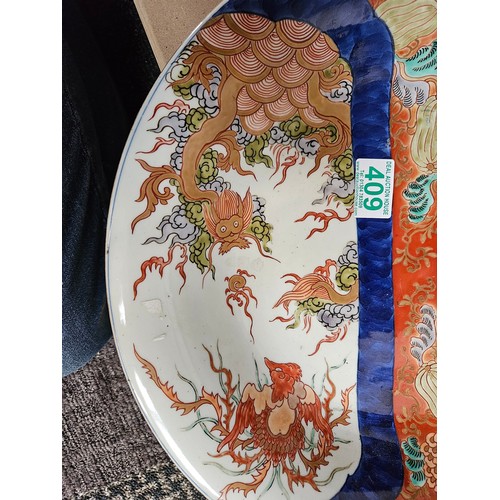 409 - Large oriental charger. Decorated to front and back 

37cm across