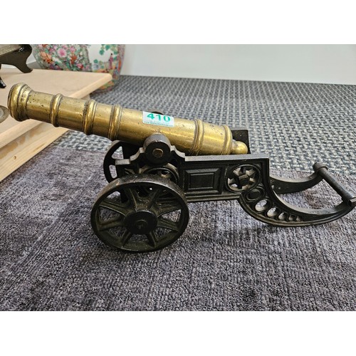 410 - 1 x Large brass cannon 

45cm total length x 21cm high