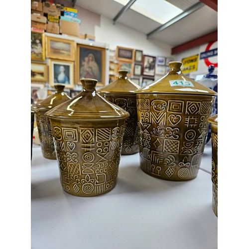 415 - Mid century storage jars
2 x large - 23cm high x 16cm across
4 x medium - 19cm high x 13cm across 
A... 