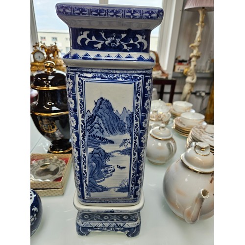 432 - Large oriental blue and white vase on stand 
42cm high (with stand) x 14cm wide