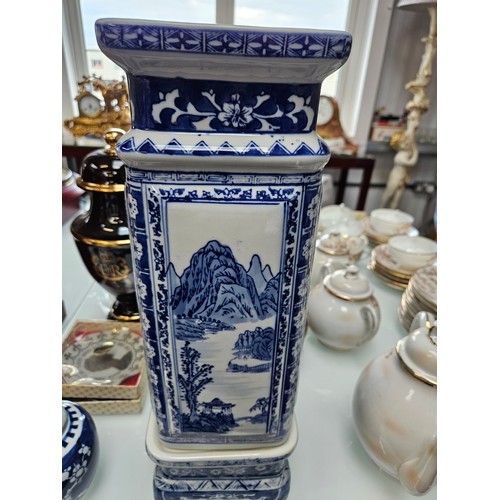 432 - Large oriental blue and white vase on stand 
42cm high (with stand) x 14cm wide