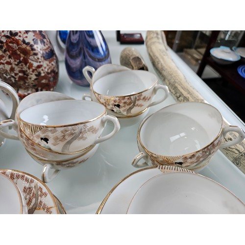 433 - Oriental tea set with jug, cups, saucers, side plates + sugar bowls