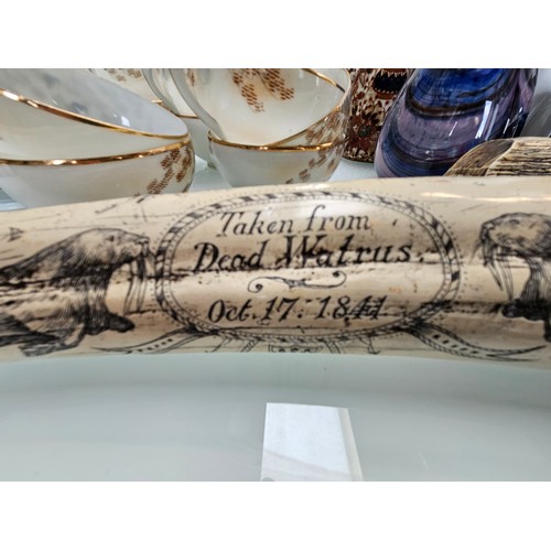 434 - 2 x large scrimshaw style engraved reproduction walrus tusk 

Large - 57cm long 
Small - 14cm