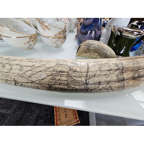 434 - 2 x large scrimshaw style engraved reproduction walrus tusk 

Large - 57cm long 
Small - 14cm