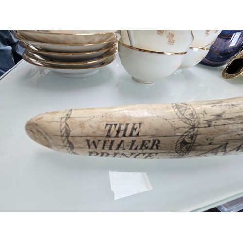 434 - 2 x large scrimshaw style engraved reproduction walrus tusk 

Large - 57cm long 
Small - 14cm