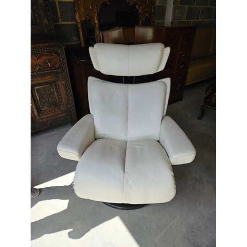 25 - Ekornes Stressless magic leather swivel and recline armchair. Very comfortable