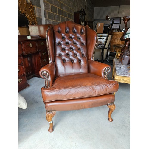 26 - Chesterfield Armchair, button back leather with cabriole legs