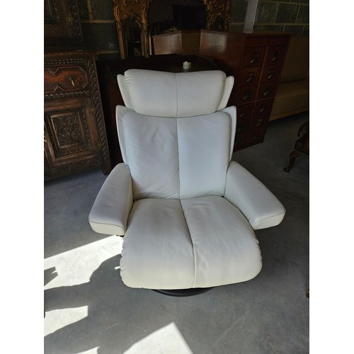 25 - Ekornes Stressless magic leather swivel and recline armchair. Very comfortable