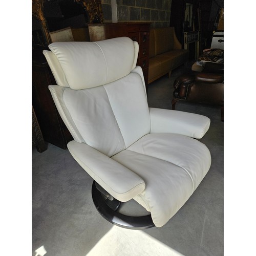 25 - Ekornes Stressless magic leather swivel and recline armchair. Very comfortable