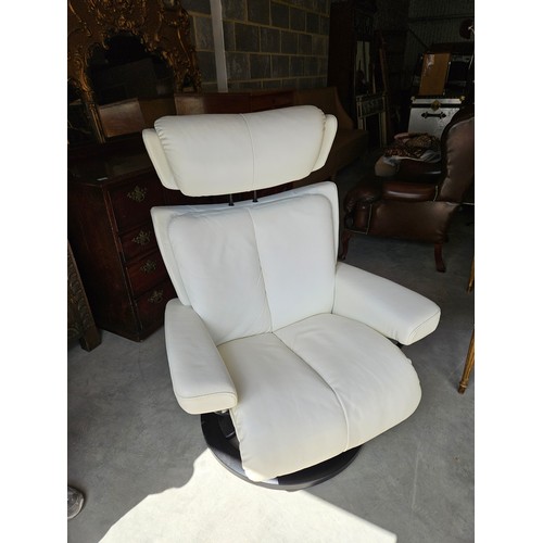 25 - Ekornes Stressless magic leather swivel and recline armchair. Very comfortable