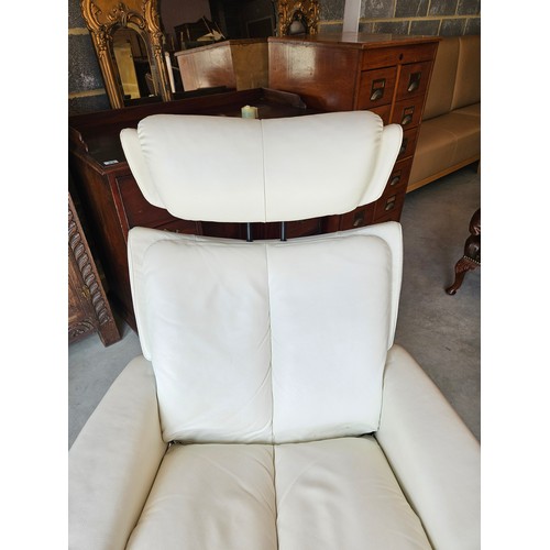 25 - Ekornes Stressless magic leather swivel and recline armchair. Very comfortable