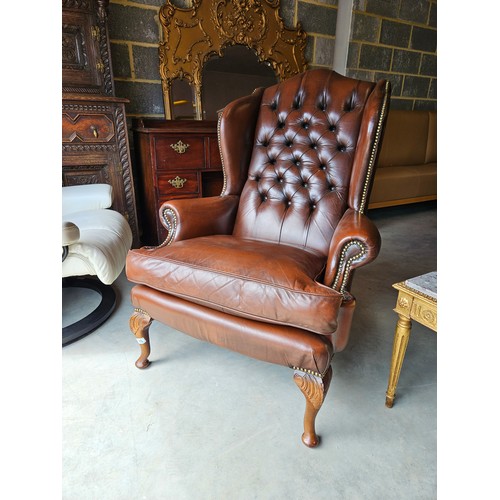 26 - Chesterfield Armchair, button back leather with cabriole legs