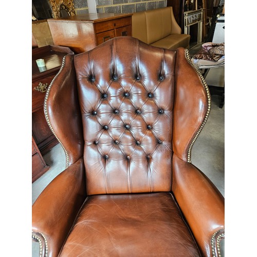 26 - Chesterfield Armchair, button back leather with cabriole legs