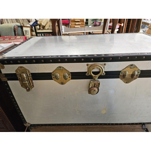 31 - Metal steamer trunk