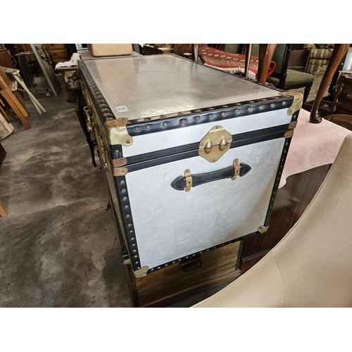 31 - Metal steamer trunk