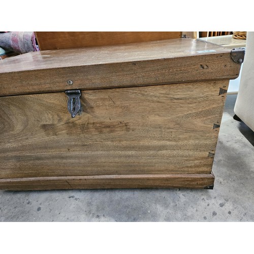 32 - Camphor wood trunk. With exterior dovetails and metal side handles.