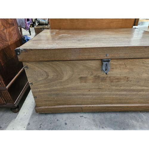 32 - Camphor wood trunk. With exterior dovetails and metal side handles.