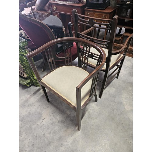 37 - Pair of similar Edwardian armchairs. Both have fine inlay work. Both with the same upholstery