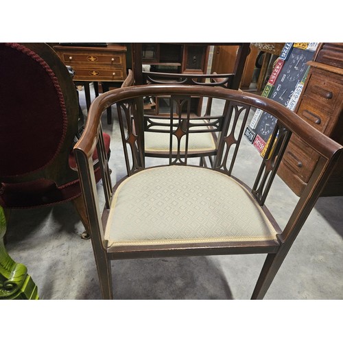 37 - Pair of similar Edwardian armchairs. Both have fine inlay work. Both with the same upholstery