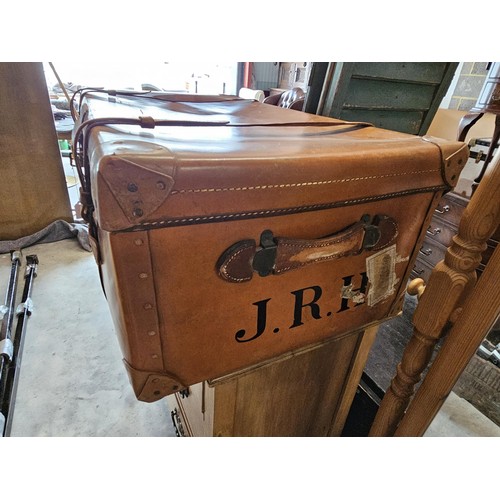 45 - Large suitcase. With straps and buckles