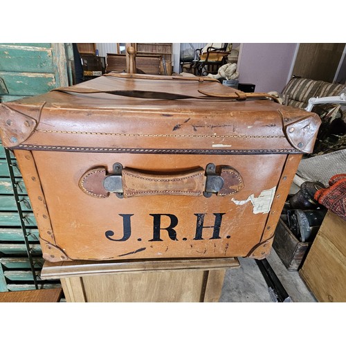 45 - Large suitcase. With straps and buckles