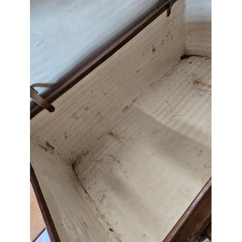 45 - Large suitcase. With straps and buckles