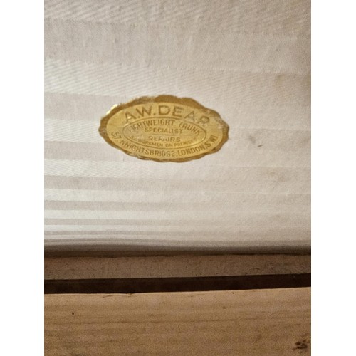 45 - Large suitcase. With straps and buckles